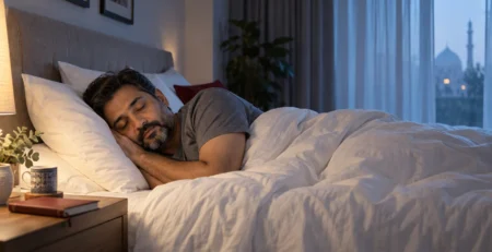Adult sleeping in a quiet bedroom at dawn.